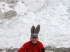 Nigel with bunny ears in front of ice fall